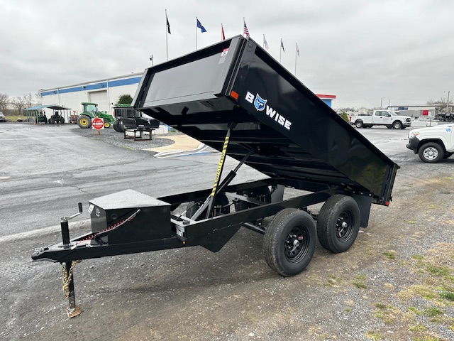 a dump trailer with the word bow wise on it