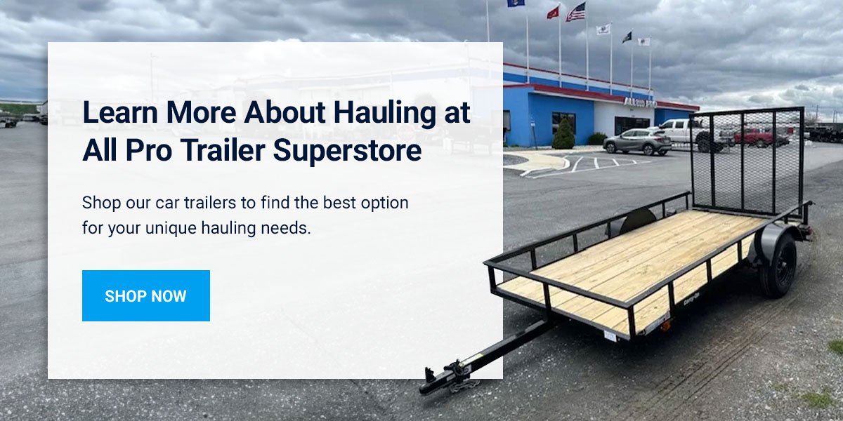 A car trailer sitting outside of Trailer Superstore