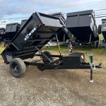 a dump trailer with the word be wise on it