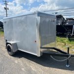 a silver trailer parked